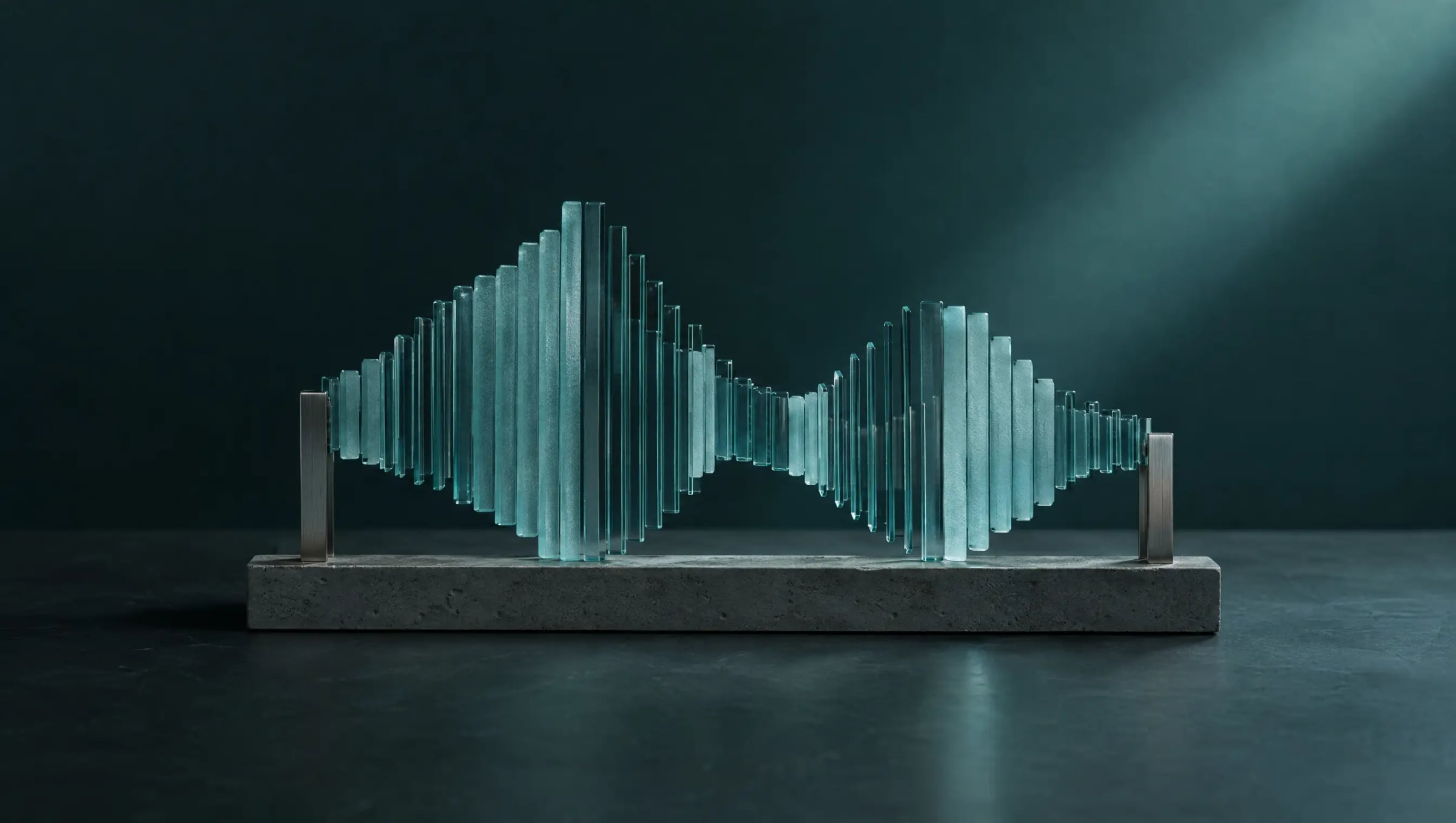 A row of glass sheets of rising and falling height shaped like a sound wave