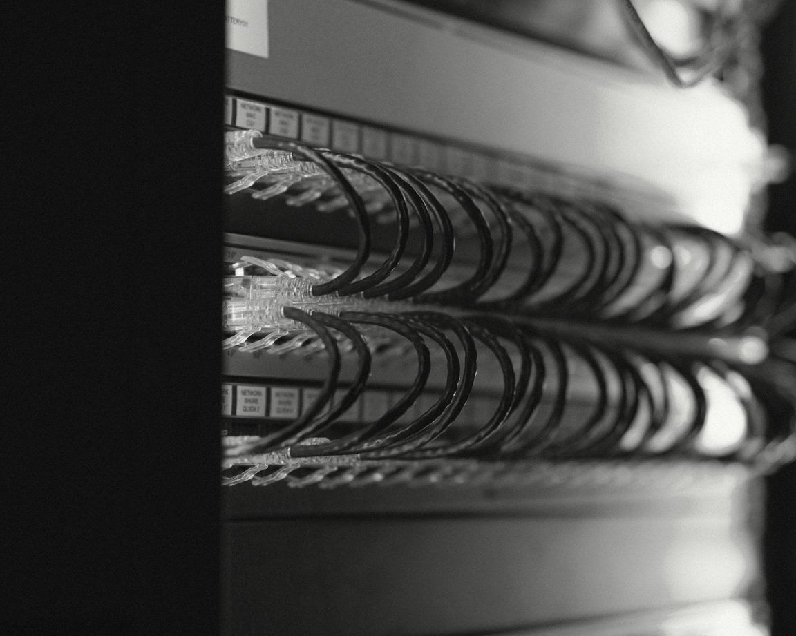 Network cables running into a server rack