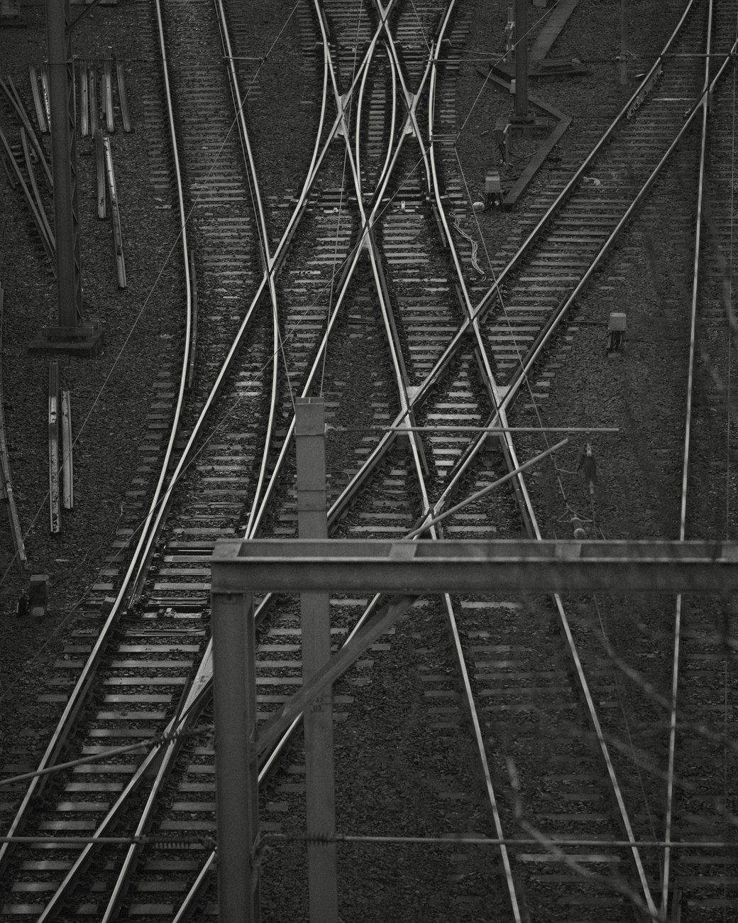 Railway tracks crossing and diverging at a busy junction